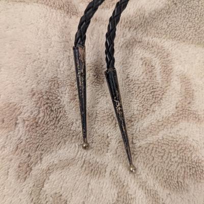 silvertone bear paw bolo with turquoise colored stone