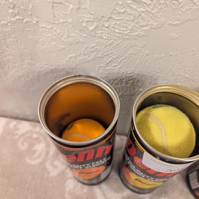 2 containers of Penn tennis balls