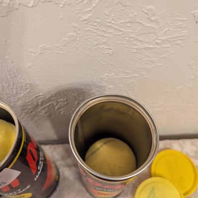 2 containers of Penn tennis balls