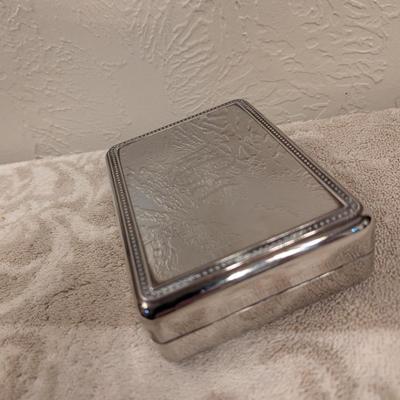 Silver tone trinket box with engraving on top