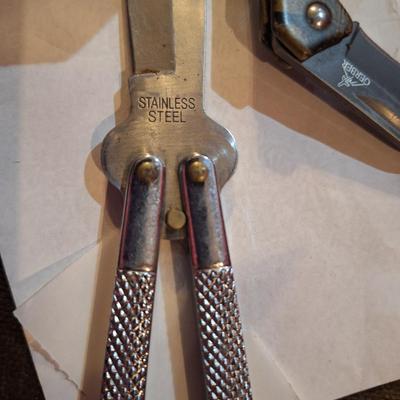 2 knives, Gerber mini folding knife and a butterfly knife