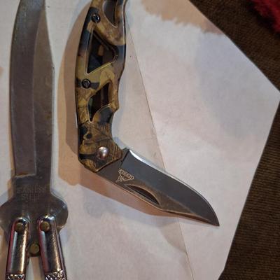 2 knives, Gerber mini folding knife and a butterfly knife