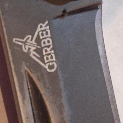 2 knives, Gerber mini folding knife and a butterfly knife