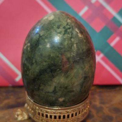 Stone egg on stand