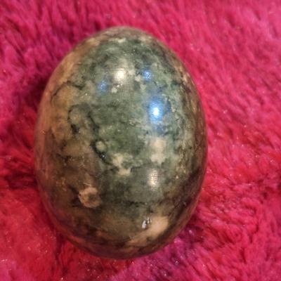 Stone egg on stand