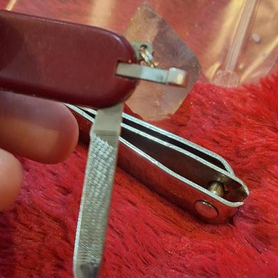 small pocket knife and nail clippers