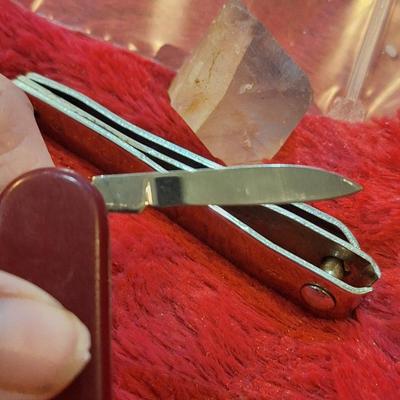 small pocket knife and nail clippers