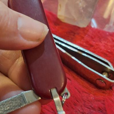 small pocket knife and nail clippers