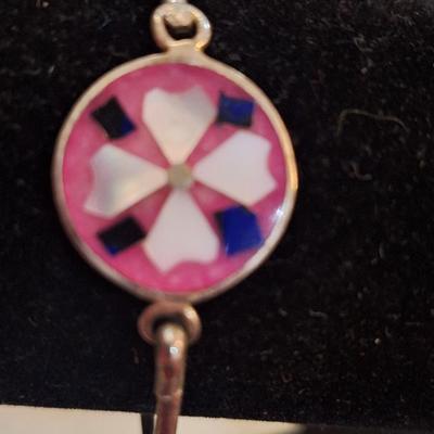 Mexican Alpaca silver town cuff bracelet with pink enamel and abalone shell floral inlay