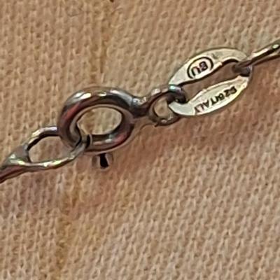 Sterling silver pendant charm necklace on long chain