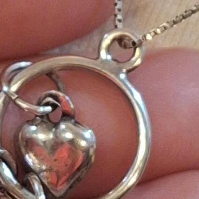 Sterling silver pendant charm necklace on long chain