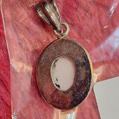 vintage sterling silver oval pendant with mother of pearl or white stone