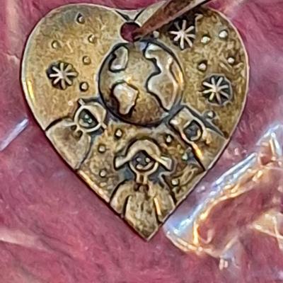 heart shaped pendant marked 925