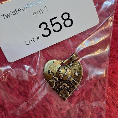 heart shaped pendant marked 925