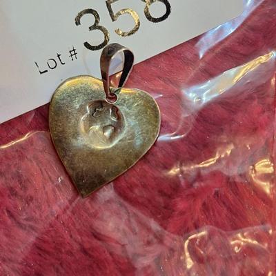 heart shaped pendant marked 925