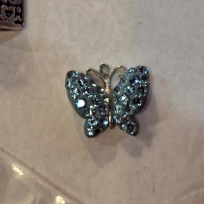 3 small charms, the butterfly is marked 925