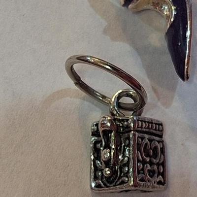 3 small charms, the butterfly is marked 925