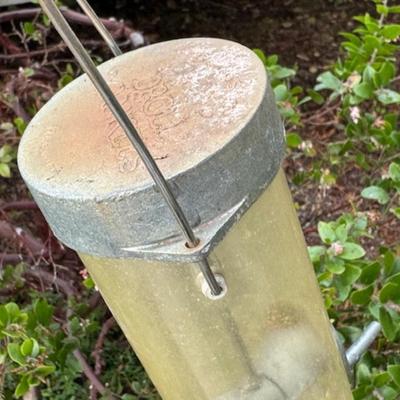 TWO BIRD FEEDERS HANGING