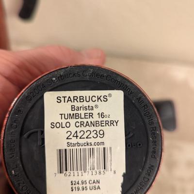 Starbucks travel tumblers- cranberry color.