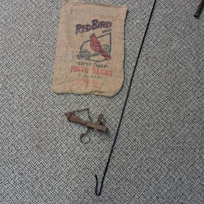 CHICKEN CATCHER, RED BIRD BURLAP BAG AND AN ANIMAL TRAP