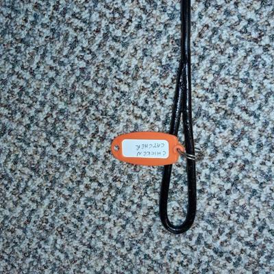 CHICKEN CATCHER, RED BIRD BURLAP BAG AND AN ANIMAL TRAP