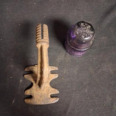 PURPLE GLASS INSULATOR AND AN IRON PERCH