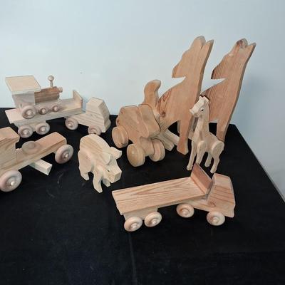 HANDCRAFTED WOODEN TOYS WITH EMBEDDED PENNY FOR YEAR MADE