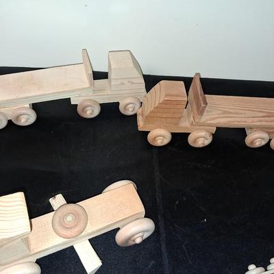 HANDCRAFTED WOODEN TOYS WITH EMBEDDED PENNY FOR YEAR MADE