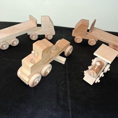 HANDCRAFTED WOODEN TOYS WITH EMBEDDED PENNY FOR YEAR MADE