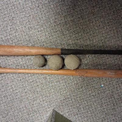 2 BASEBALL BATS AND BALLS