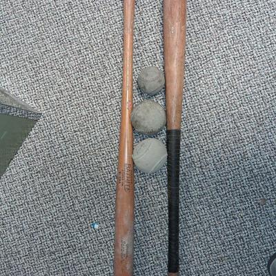 2 BASEBALL BATS AND BALLS