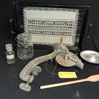 DOILY UNDER GLASS ON A SERVING TRAY, FOOD GRINDER AND MORE