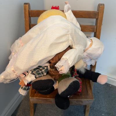 Small Folding Chair for child with Dolls on it. 