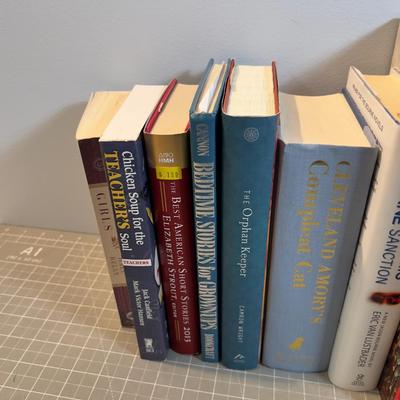 Stack of Novels and Reference Books 