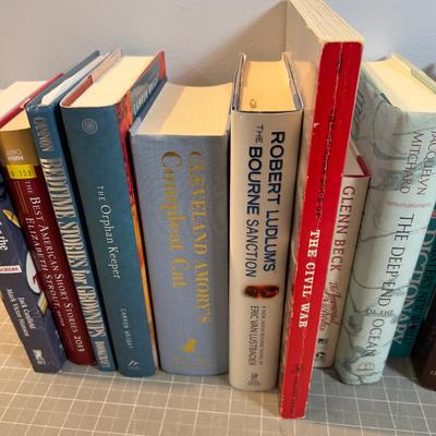 Stack of Novels and Reference Books 