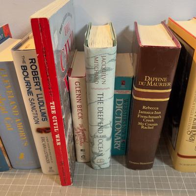 Stack of Novels and Reference Books 