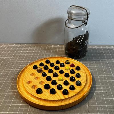 Marbles and Dominoes in an old Jar