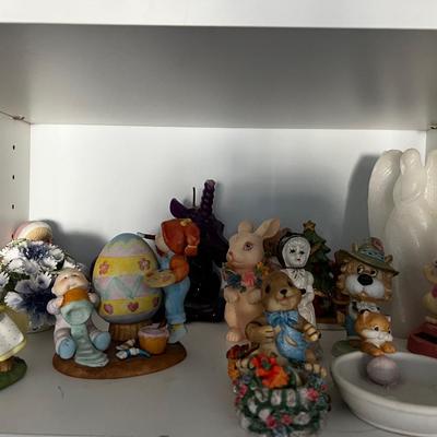 Shelf Full of Figurines in the Closet