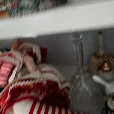 Shelf Full of Figurines in the Closet