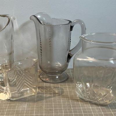 4 Glass Vintage Pitchers