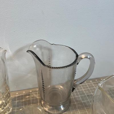 4 Glass Vintage Pitchers