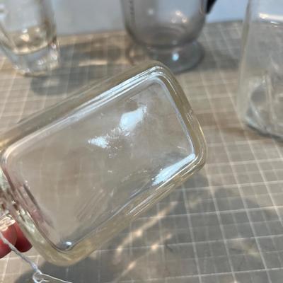 4 Glass Vintage Pitchers