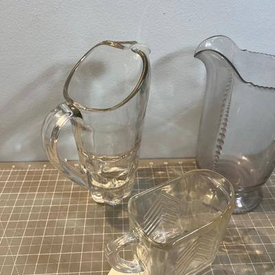 4 Glass Vintage Pitchers