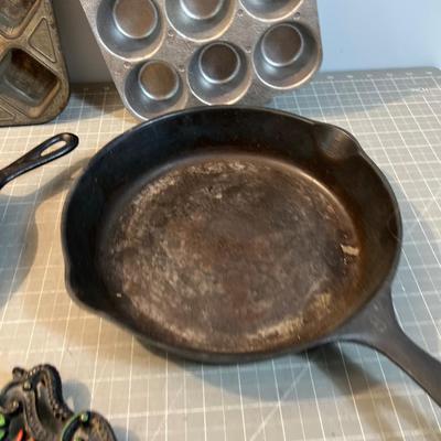 A Few Pieces of Cast Iron and 2 Muffin Aluminum and Steel 