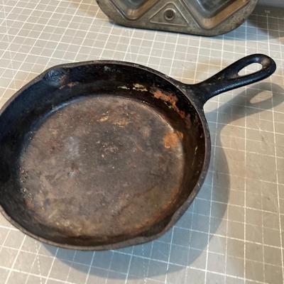 A Few Pieces of Cast Iron and 2 Muffin Aluminum and Steel 