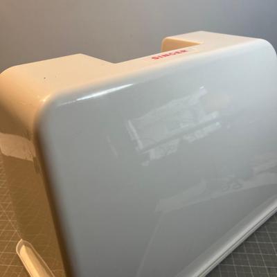 SINGER Sewing Machine Plus a Box of Bobbins 