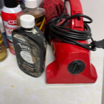 Basement: Dirt Divel Vacuum and Cleaning Supplies 