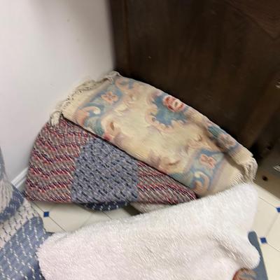 Basement: Pile of Rugs 