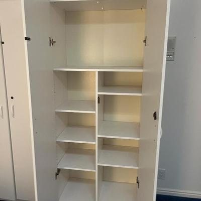 Basement: 2 White Melamine Cupboard  