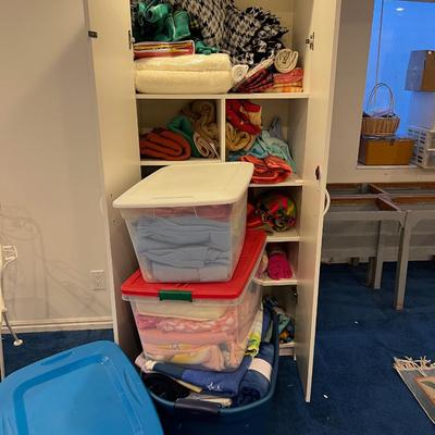 Basement: 4 Tubs and a cabinet full of FABRIC - Mostly Fleece